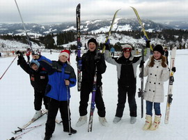 On the hill on skis. English Camp Magic Camp